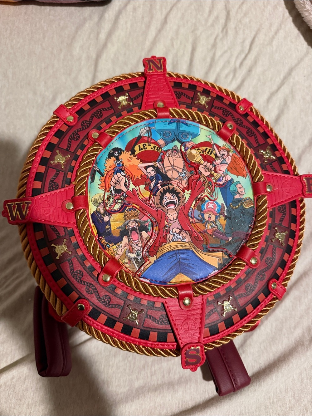 Loungefly Red One Piece Round Character Backpack with Gold Trim